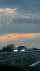 Dramatic sunset captured during highway drive in Bulgaria