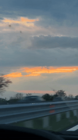 Dramatic sunset captured during highway drive in Bulgaria