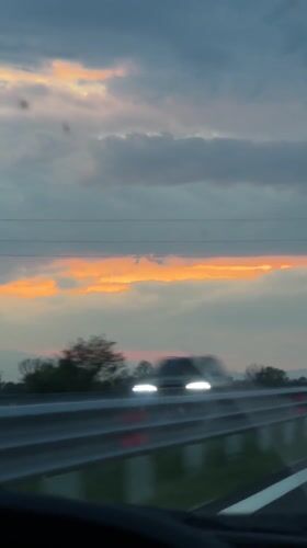 Dramatic sunset captured during highway drive in Bulgaria