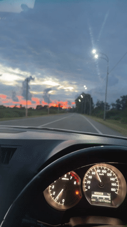 Sunset drive through Adzyubzha roads at dusk