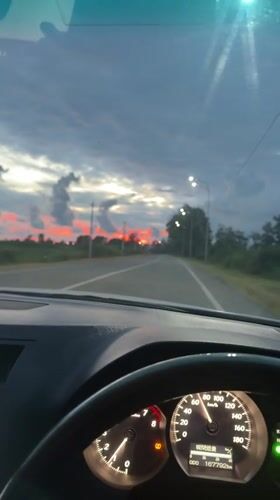 Sunset drive through Adzyubzha roads at dusk