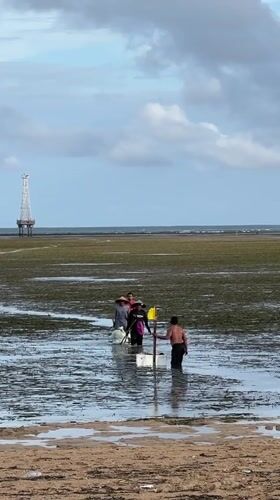 Morning beach activities and kite flying in Denpasar