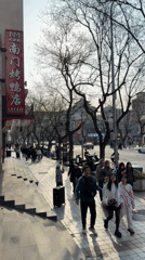 Late night street activity documented in Beijing's Dongcheng District