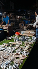 Fresh seafood market bustles in Lhokseumawe, Indonesia