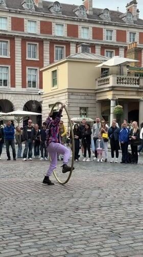 Street performers entertain crowds across central London tourist areas