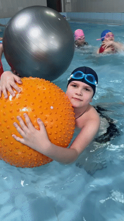 Children play and swim at indoor pool in Birobidzhan