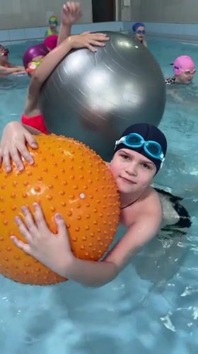 Children play and swim at indoor pool in Birobidzhan