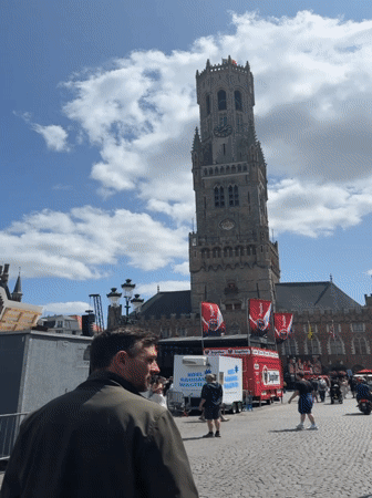 Bruges' Markt square on a clear summer afternoon