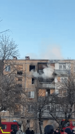 Apartment building fire draws emergency response on snowy streets