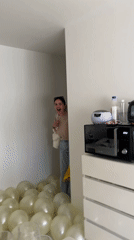 Surprise birthday celebration with champagne and balloons captured