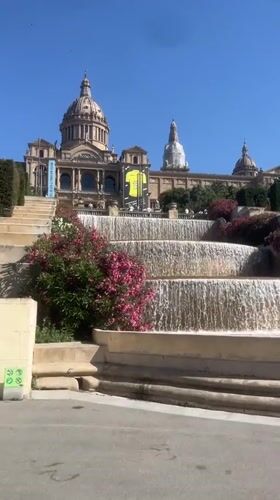 Sunny afternoon at Montjuïc — fountains, palace, and street music