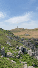 Coastal cliffs and communications tower documented in Mayak Byusse