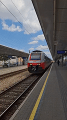 Spring morning in Vienna: train arrival, blooming flowers