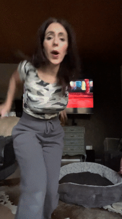 Couple enjoys quiet Saturday afternoon dancing, cooking, dog walking