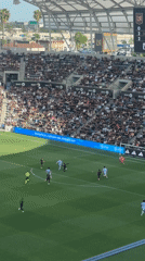 Soccer match underway at packed BMO Stadium in Los Angeles