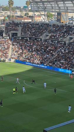 Soccer match underway at packed BMO Stadium in Los Angeles