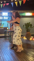 Couples dancing outside a Ko Samui beachside bar at night