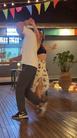 Couples dancing outside a Ko Samui beachside bar at night