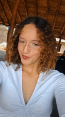 Social gathering captured through smartphone selfies at outdoor venue