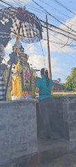 Evening street life and prayer captured in Denpasar