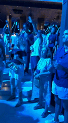 Outdoor party with blue lights draws crowd in Kuta Selatan