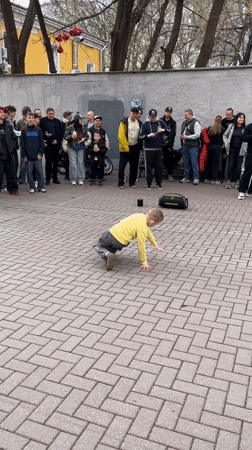 Breakdancers perform hip-hop routines for crowds in Moscow square