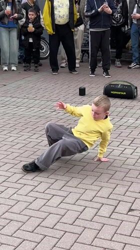Breakdancers perform hip-hop routines for crowds in Moscow square