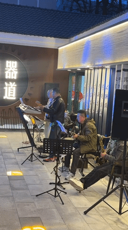 Street band performs outdoor concert in Zhongtun, China