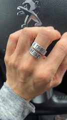 Moscow resident tries on silver rings in car selfie session