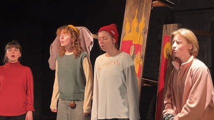 Young performers stage a cappella show with religious imagery