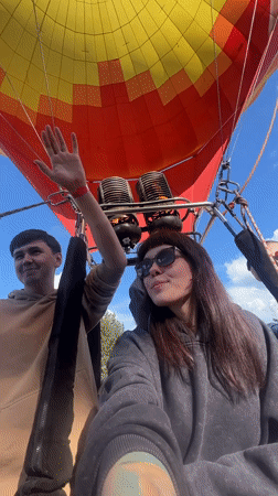 Hot air balloon prep, child drumming observed in Chaykovsky