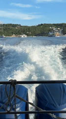 Passenger ferry crosses waters near Kampung Toyapakeh, Indonesia
