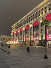 Nighttime walk documented through illuminated central Moscow buildings