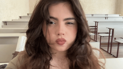 Woman records playful selfie video on Moscow street