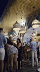 Lively beach club night in Balchik with live music and harbor views