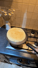 Person cooks pancakes in Great Yarmouth kitchen Tuesday evening