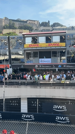 Racing event observed at Monaco venue with corporate signage