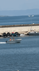 Motorboats and jet skis out on the water near Chernomorets