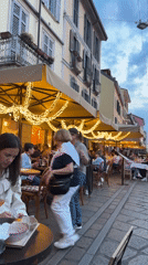 Evening dining scenes documented across Milan streets and canals