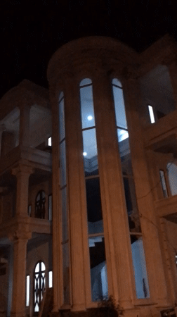 Construction site illuminated at night in Lhokseumawe, Indonesia