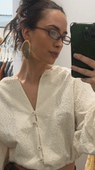Woman takes morning mirror selfies while shopping in Krasnoyarsk