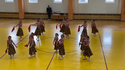 Girls perform folk dance in Russian gymnasium