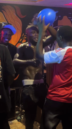 Young adults gather at dimly lit venue in Durimi Nigeria