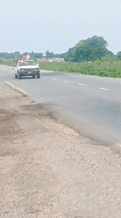 Rusty white station wagon spotted on Nigerian road