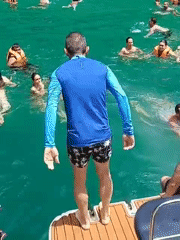 Longtail boat trip with swimming stop near towering cliffs