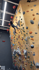 Children learn indoor rock climbing at Netanya gym