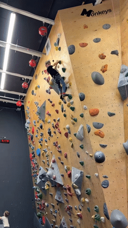 Children learn indoor rock climbing at Netanya gym