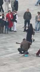 Street musicians perform in Dmitrov square amid afternoon activities