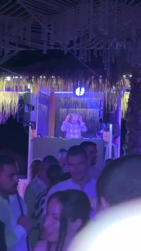 Beach club party with DJ and tropical decor in Burgas