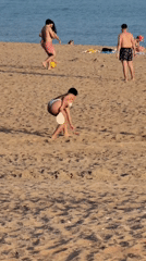 Beach games and afternoon activity on Quarteira's shoreline
